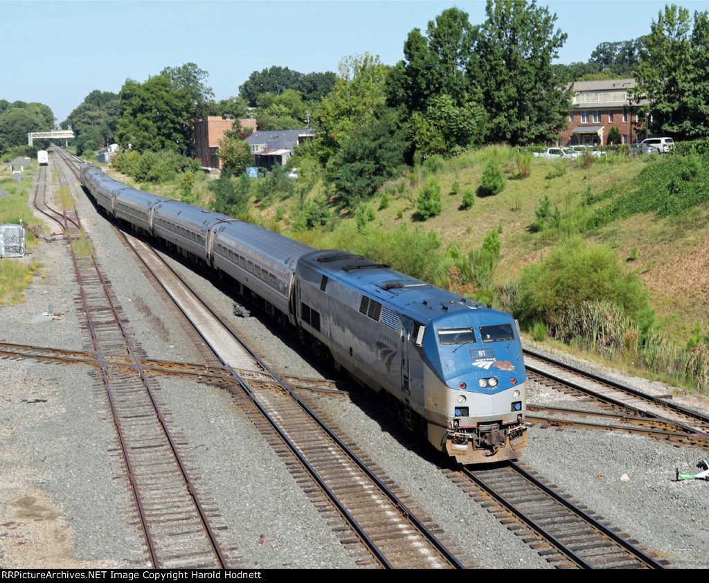 AMTK 81 leads train P080-02 across Boylan Junction